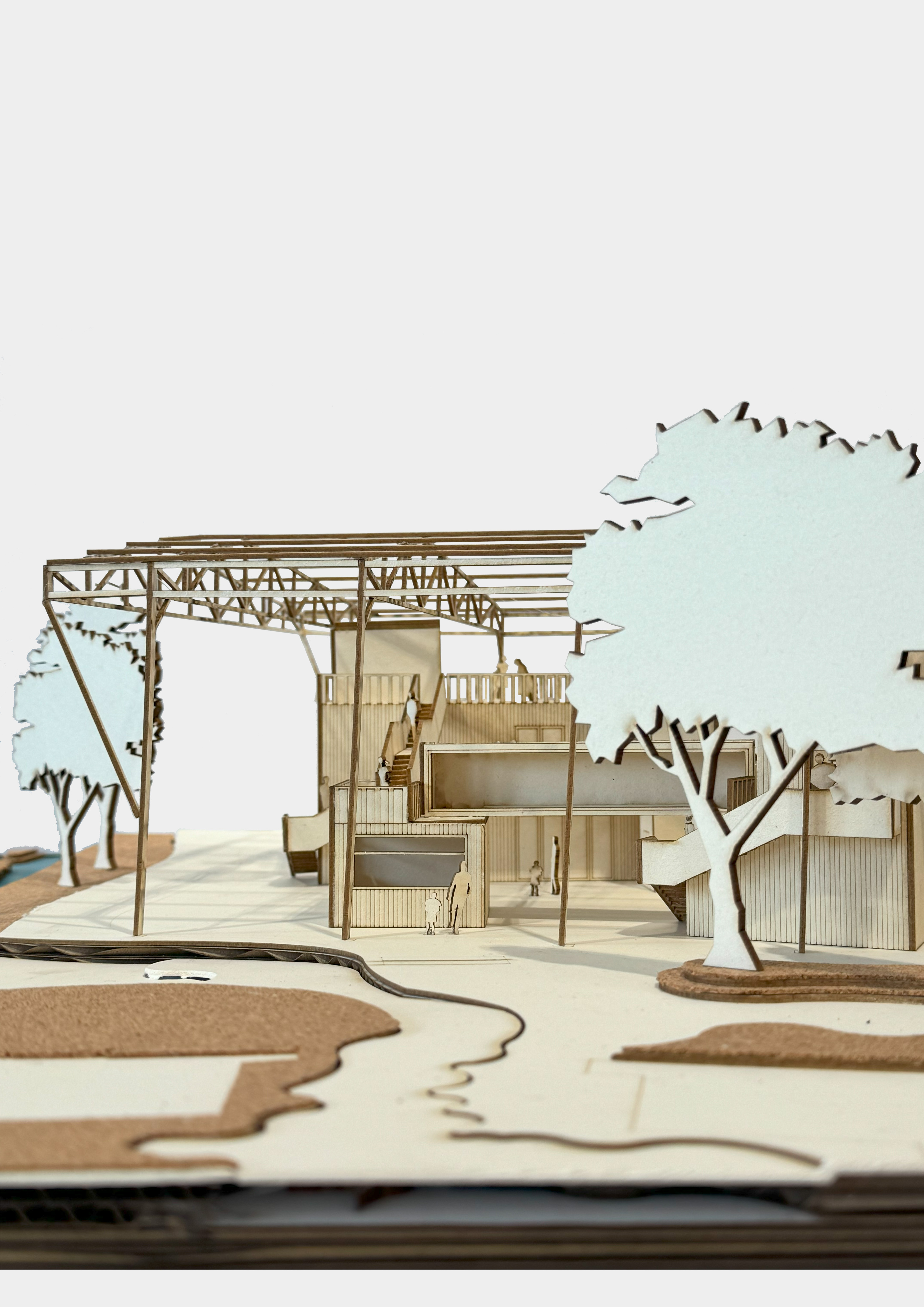 Site model showing the theatre in landscape context with trees